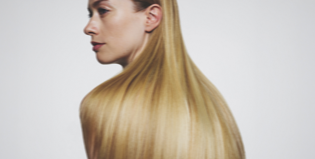 Omnivit Hair Glam. Een premium haarformule met plantenextracten. Voor zichtbaar glanzend en gezond haar.
